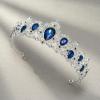 imageSWEETV Royal CZ Crystal Tiara for Women Blue Wedding Crown for Brides Princess Headpieces Bridal Hair Accessories for Birthday Party Pageant SapphireSilverEleanorSapphireSilver